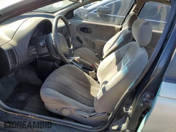 1997 Saturn SL с VIN 1G8ZK5274VZ271990, выставлен на аукционе Copart как лот 87279155 с пробегом 147 825 миль миль и Списание • Salvage title. История ставок и продаж доступна на DreamBid. Изображение 7.