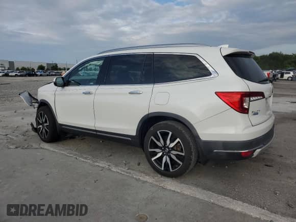 2021 Honda Pilot Touring 8-Passenger z VIN 5FNYF5H99MB039369, wystawiony jako Copart lot #69393035 z przebiegiem Nie podano mil oraz Szkoda całkowita • Salvage title. Historia ofert i sprzedaży dostępna na DreamBid. Obrazek 2.