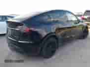 2023 Tesla Model Y Long Range z VIN 7SAYGAEE7PF767951, wystawiony jako IAAI lot #43128878 z przebiegiem 36 431 mil mil oraz . Historia ofert i sprzedaży dostępna na DreamBid. Obrazek 4.