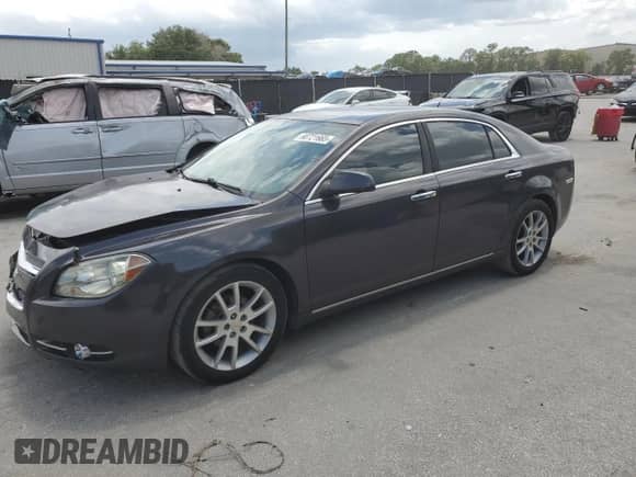 2010 Chevrolet Malibu LTZ with VIN 1G1ZE5E75A4133481, listed as a Copart auction lot 60721665 with 157,868 mi miles and Salvage title. Bid and sale history available at DreamBid. Image 1.