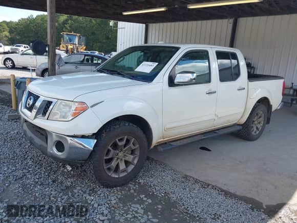 2015 Nissan Frontier SL z VIN 1N6AD0EV8FN748095, wystawiony jako IAAI lot #43320483 z przebiegiem 187 141 mil mil oraz . Historia ofert i sprzedaży dostępna na DreamBid. Obrazek 19.