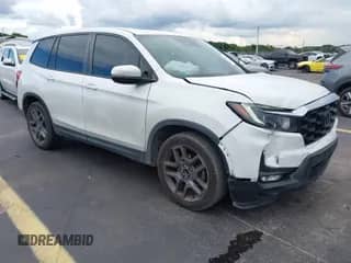 2022 Honda Passport EX-L with VIN 5FNYF7H53NB005258, listed as a IAAI auction lot 43291545 with 82,070 mi miles and . Bid and sale history available at DreamBid. Image 1.