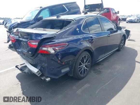 2021 Toyota Camry SE Nightshade z VIN 4T1G11AKXMU519763, wystawiony jako IAAI lot #43319480 z przebiegiem 97 862 mil mil oraz . Historia ofert i sprzedaży dostępna na DreamBid. Obrazek 4.