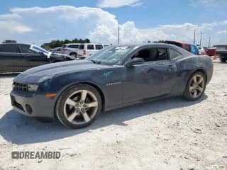 2013 Chevrolet Camaro LS с VIN 2G1FA1E34D9150245, выставлен на аукционе Copart как лот 69228725 с пробегом 105 667 миль миль и Списание • Salvage title. История ставок и продаж доступна на DreamBid. Изображение 1.