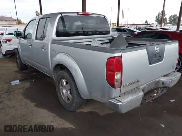 2006 Nissan Frontier LE with VIN 1N6AD07U06C436191, listed as a IAAI auction lot 41560700 with 185,712 mi miles and . Bid and sale history available at DreamBid. Image 3.