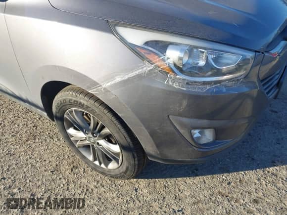 2014 Hyundai Tucson Walking Dead Edition z VIN KM8JUCAG1EU808097, wystawiony jako IAAI lot #41436214 z przebiegiem 114 198 mil mil oraz . Historia ofert i sprzedaży dostępna na DreamBid. Obrazek 6.