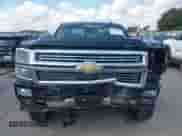 2015 Chevrolet Silverado 1500 High Country z VIN 3GCPCTEC9FG409015, wystawiony jako IAAI lot #43079243 z przebiegiem 87 290 mil mil oraz . Historia ofert i sprzedaży dostępna na DreamBid. Obrazek 6.