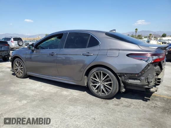 2023 Toyota Camry Hybrid SE with VIN 4T1S31AK1PU047641, listed as a Copart auction lot 81819185 with 172,735 mi miles and Salvage title. Bid and sale history available at DreamBid. Image 2.