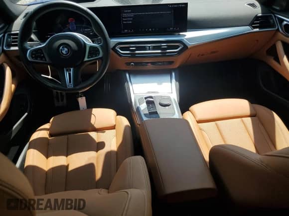 2024 BMW i4 M50 with VIN WBY33AW0XRFT10327, listed as a Copart auction lot 64826705 with 4,697 mi miles and Salvage title. Bid and sale history available at DreamBid. Image 8.