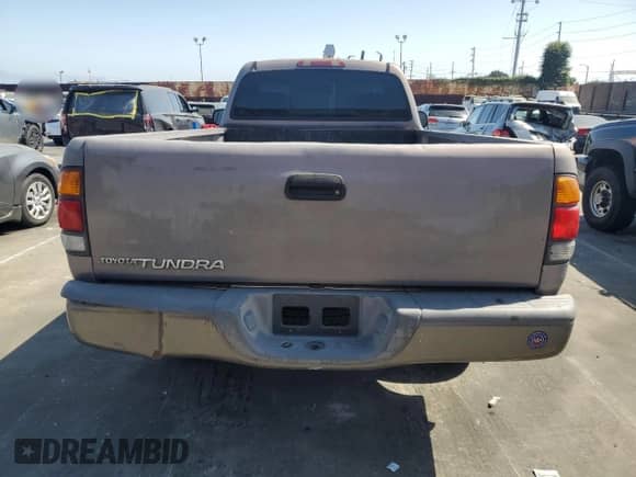 2002 Toyota Tundra z VIN 5TBJN32172S228969, wystawiony jako Copart lot #68913015 z przebiegiem 332 201 mil mil oraz Czysty tytuł • Clean title. Historia ofert i sprzedaży dostępna na DreamBid. Obrazek 6.