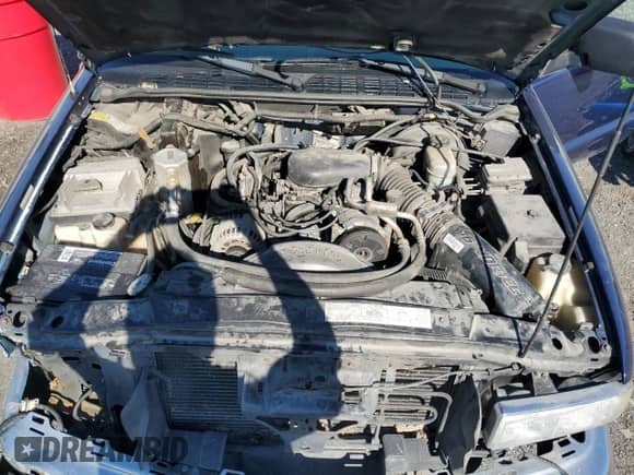 2001 Chevrolet Blazer LS z VIN 1GNCT18W21K182784, wystawiony jako Copart lot #76004174 z przebiegiem 153 833 mil mil oraz Szkoda całkowita • Salvage title. Historia ofert i sprzedaży dostępna na DreamBid. Obrazek 12.