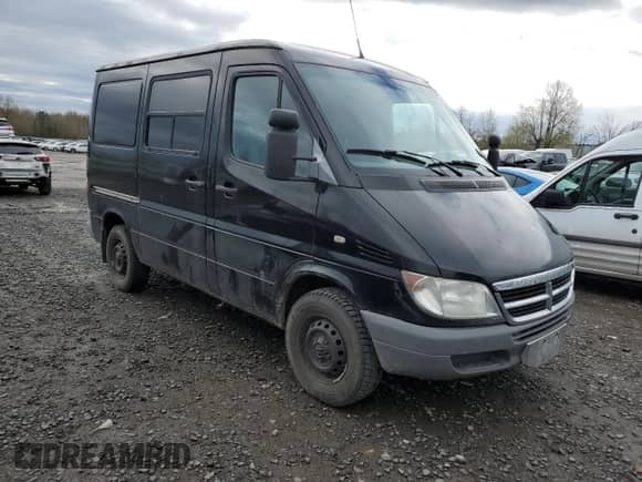 2004 Dodge Sprinter with VIN WD2PD144X45655232, listed as a Copart auction lot 50697675 with 212,674 mi miles and Salvage title. Bid and sale history available at DreamBid. Image 4.
