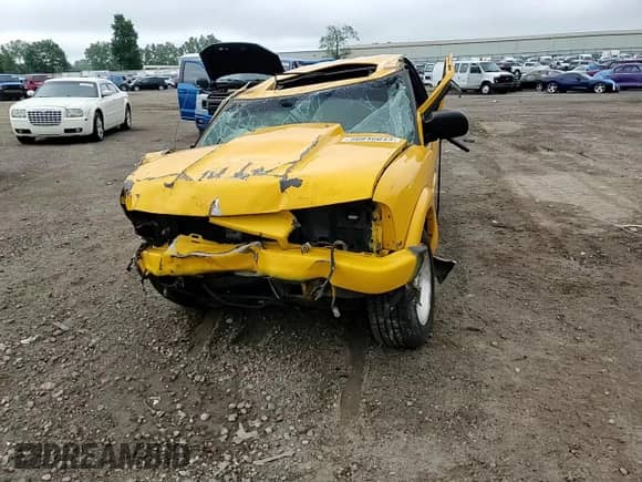 2003 Chevrolet Blazer LS z VIN 1GNCS18X43K116185, wystawiony jako Copart lot #56846644 z przebiegiem Nie podano mil oraz Czysty tytuł • Clean title. Historia ofert i sprzedaży dostępna na DreamBid. Obrazek 11.