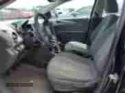 2012 Chevrolet Sonic LT z VIN 1G1JD5SB3C4210389, wystawiony jako Copart lot #66197265 z przebiegiem 150 926 mil mil oraz Szkoda całkowita • Salvage title. Historia ofert i sprzedaży dostępna na DreamBid. Obrazek 7.