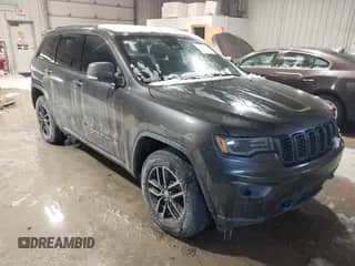 2017 Jeep Grand Cherokee Trailhawk z VIN 1C4RJFLT7HC778237, wystawiony jako IAAI lot #41558039 z przebiegiem 128 003 mil mil oraz . Historia ofert i sprzedaży dostępna na DreamBid. Obrazek 1.