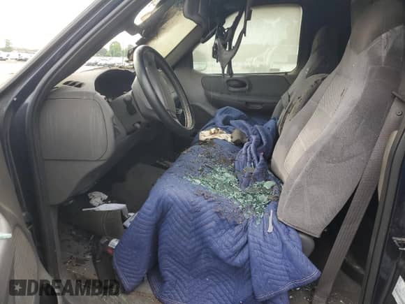 2002 Ford F-150 XL с VIN 2FTRF18W92CA67776, выставлен на аукционе Copart как лот 54002365 с пробегом Не указан миль и Списание • Salvage title. История ставок и продаж доступна на DreamBid. Изображение 7.