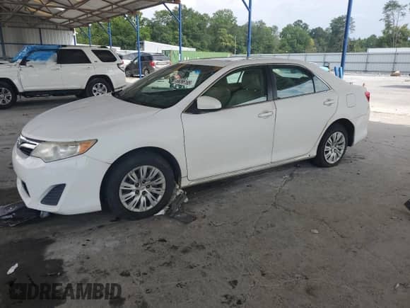 2014 Toyota Camry SE with VIN 4T1BF1FK7EU810694, listed as a Copart auction lot 66096195 with 321,874 mi miles and Salvage title. Bid and sale history available at DreamBid. Image 1.