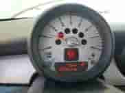 2011 MINI Hardtop with VIN WMWSU3C52BT096248, listed as a Copart auction lot 62008285 with 129,794 mi miles and Salvage title. Bid and sale history available at DreamBid. Image 9.