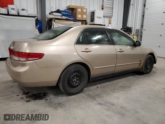 2003 Honda Accord LX z VIN 1HGCM56443A816895, wystawiony jako Copart lot #60211995 z przebiegiem 268 839 mil mil oraz Czysty tytuł • Clean title. Historia ofert i sprzedaży dostępna na DreamBid. Obrazek 3.