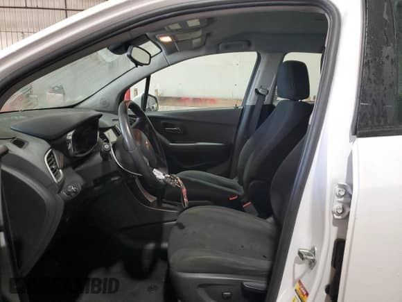 2017 Chevrolet Trax LS with VIN 3GNCJKSB6HL271042, listed as a Copart auction lot 80087035 with 111,560 mi miles and Salvage title. Bid and sale history available at DreamBid. Image 7.