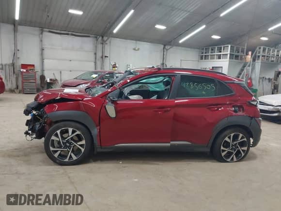 2022 Hyundai Kona Limited z VIN KM8K5CA37NU838624, wystawiony jako IAAI lot #42856505 z przebiegiem 55 013 mil mil oraz . Historia ofert i sprzedaży dostępna na DreamBid. Obrazek 14.