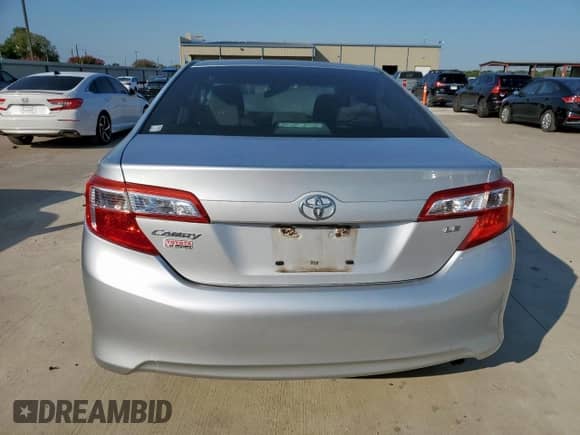 2014 Toyota Camry L с VIN 4T4BF1FK6ER350885, выставлен на аукционе Copart как лот 72104345 с пробегом 168 250 миль миль и Списание • Salvage title. История ставок и продаж доступна на DreamBid. Изображение 6.