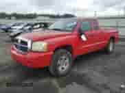 2006 Dodge Dakota SLT with VIN 1D7HW42K06S516403, listed as a Copart auction lot 61391645 with 56,737 mi miles and Salvage title. Bid and sale history available at DreamBid. Image 1.