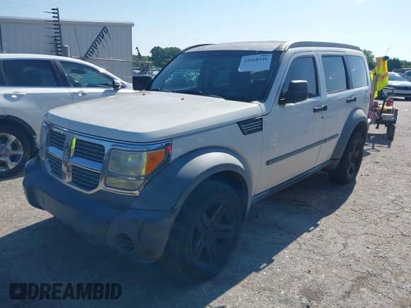 2007 Dodge Nitro SXT with VIN 1D8GT28K47W648991, listed as a IAAI auction lot 42668340 with 227,056 mi miles and . Bid and sale history available at DreamBid. Image 2.