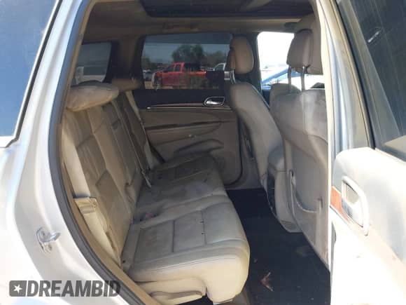 2012 Jeep Grand Cherokee Limited z VIN 1C4RJEBG9CC211082, wystawiony jako IAAI lot #42694437 z przebiegiem 149 205 mil mil oraz . Historia ofert i sprzedaży dostępna na DreamBid. Obrazek 8.