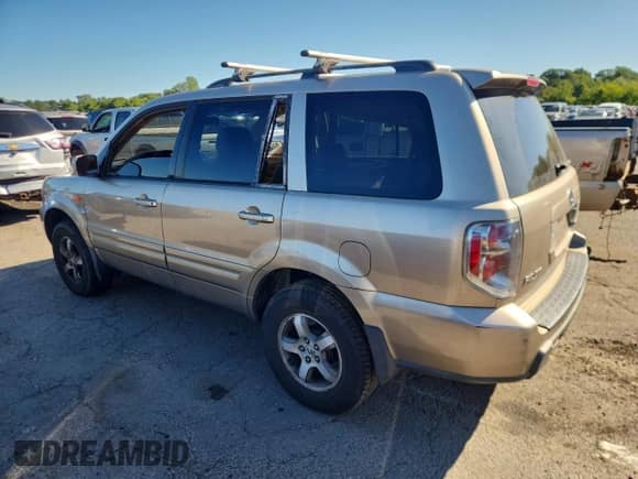 2006 Honda Pilot EX-L with VIN 2HKYF18616H525614, listed as a Copart auction lot 69956975 with 203,446 mi miles and Salvage title. Bid and sale history available at DreamBid. Image 2.