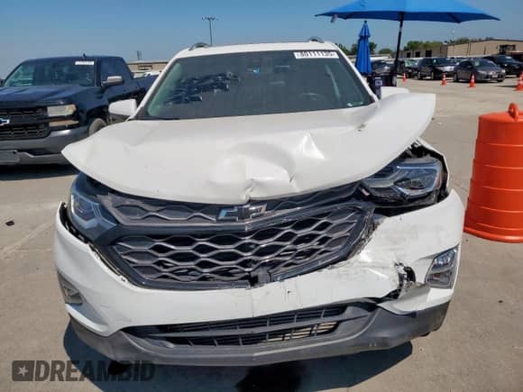 2020 Chevrolet Equinox LT с VIN 3GNAXKEVXLS735427, выставлен на аукционе Copart как лот 80111135 с пробегом 83 405 миль миль и Списание • Salvage title. История ставок и продаж доступна на DreamBid. Изображение 5.