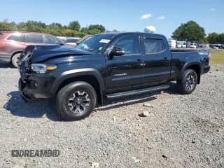2022 Toyota Tacoma SR5 с VIN 3TMDZ5BN0NM126313, выставлен на аукционе Copart как лот 71477215 с пробегом 51 655 миль миль и Списание • Salvage title. История ставок и продаж доступна на DreamBid. Изображение 1.