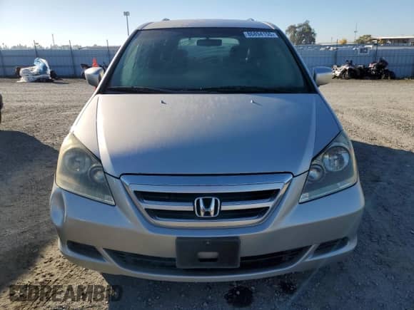 2005 Honda Odyssey EX z VIN 5FNRL38445B410168, wystawiony jako Copart lot #86894155 z przebiegiem 163 842 mil mil oraz Szkoda całkowita • Salvage title. Historia ofert i sprzedaży dostępna na DreamBid. Obrazek 5.