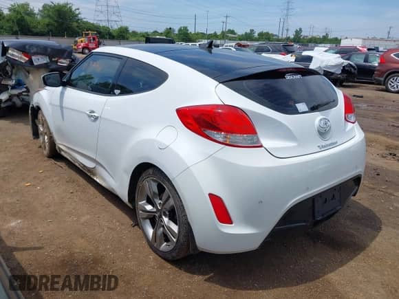 2014 Hyundai Veloster с VIN KMHTC6AD1EU199273, выставлен на аукционе IAAI как лот 42759448 с пробегом 174 507 миль миль и . История ставок и продаж доступна на DreamBid. Изображение 3.