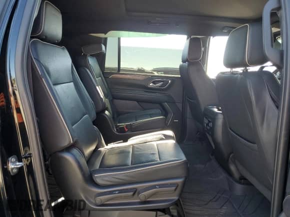 2023 Chevrolet Suburban Premier z VIN 1GNSKFKD9PR296378, wystawiony jako Copart lot #66596445 z przebiegiem Nie podano mil oraz Szkoda całkowita • Salvage title. Historia ofert i sprzedaży dostępna na DreamBid. Obrazek 11.