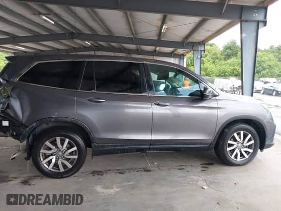 2019 Honda Pilot EX-L with VIN 5FNYF5H56KB041767, listed as a IAAI auction lot 42948153 with 162,074 mi miles and . Bid and sale history available at DreamBid. Image 13.