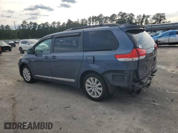 2013 Toyota Sienna LE with VIN 5TDJK3DC7DS056783, listed as a Copart auction lot 70763105 with 115,117 mi miles and Clean title. Bid and sale history available at DreamBid. Image 2.