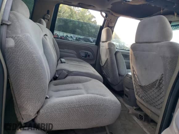 1997 Chevrolet Suburban z VIN 3GNEC16R6VG167319, wystawiony jako Copart lot #77485194 z przebiegiem 188 479 mil mil oraz Szkoda całkowita • Salvage title. Historia ofert i sprzedaży dostępna na DreamBid. Obrazek 11.