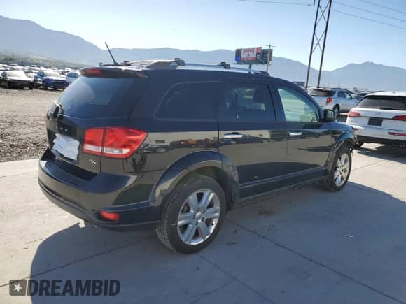 2012 Dodge Journey R/T with VIN 3C4PDDFG2CT215076, listed as a Copart auction lot 63874725 with 121,978 mi miles and Salvage title. Bid and sale history available at DreamBid. Image 3.