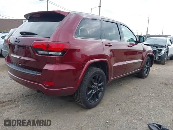 2020 Jeep Grand Cherokee Altitude with VIN 1C4RJFAG0LC233091, listed as a IAAI auction lot 42706976 with 66,255 mi miles and . Bid and sale history available at DreamBid. Image 4.