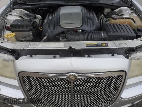 2005 Chrysler 300 C with VIN 2C3JA63H95H616602, listed as a Copart auction lot 72047815 with 105,959 mi miles and Salvage title. Bid and sale history available at DreamBid. Image 11.