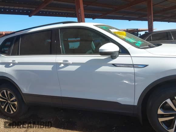 2022 Volkswagen Tiguan S with VIN 3VV1B7AX2NM001840, listed as a IAAI auction lot 41425588 with 28,720 mi miles and . Bid and sale history available at DreamBid. Image 13.