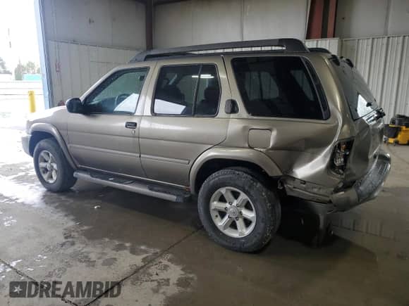 2003 Nissan Pathfinder SE z VIN JN8DR09Y23W807996, wystawiony jako Copart lot #56011985 z przebiegiem 158 727 mil mil oraz Szkoda całkowita • Salvage title. Historia ofert i sprzedaży dostępna na DreamBid. Obrazek 2.
