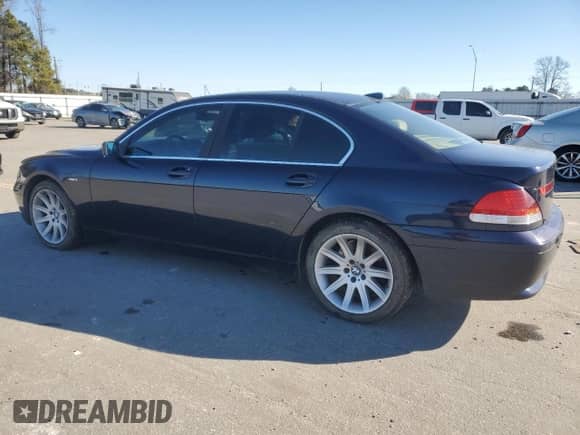 2003 BMW 7 Series 745i with VIN WBAGL63433DP63566, listed as a Copart auction lot 87365424 with 167,697 mi miles and Salvage title. Bid and sale history available at DreamBid. Image 2.