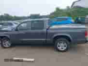 2003 Dodge Dakota Sport with VIN 1D7HL38X13S234210, listed as a IAAI auction lot 42913327 with 173,497 mi miles and . Bid and sale history available at DreamBid. Image 14.