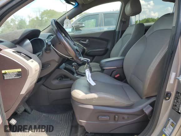 2015 Hyundai Tucson SE z VIN KM8JUCAG1FU074997, wystawiony jako Copart lot #70651335 z przebiegiem 95 867 mil mil oraz Szkoda całkowita • Salvage title. Historia ofert i sprzedaży dostępna na DreamBid. Obrazek 7.