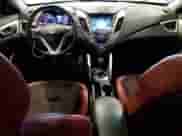 2012 Hyundai Veloster w/Gray Int z VIN KMHTC6AD3CU052773, wystawiony jako Copart lot #70096015 z przebiegiem 154 233 mil mil oraz Czysty tytuł • Clean title. Historia ofert i sprzedaży dostępna na DreamBid. Obrazek 8.