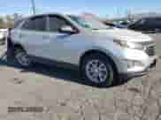 2021 Chevrolet Equinox LS z VIN 3GNAXHEVXMS141652, wystawiony jako Copart lot #71644165 z przebiegiem 77 388 mil mil oraz Szkoda całkowita • Salvage title. Historia ofert i sprzedaży dostępna na DreamBid. Obrazek 4.