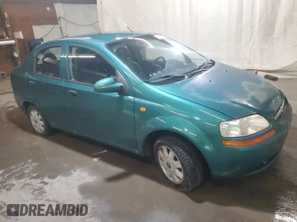 2004 Chevrolet Aveo LS with VIN KL1TJ52604B148255, listed as a Copart auction lot 52167815 with 67,162 mi miles and Clean title. Bid and sale history available at DreamBid. Image 4.