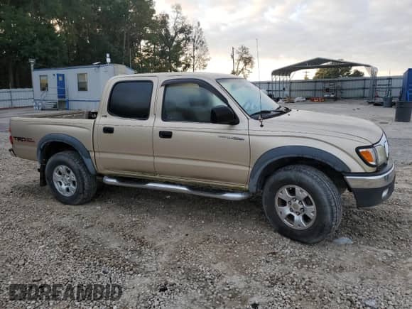 2002 Toyota Tacoma PreRunner z VIN 5TEGM92N42Z059071, wystawiony jako Copart lot #86554525 z przebiegiem 264 637 mil mil oraz Czysty tytuł • Clean title. Historia ofert i sprzedaży dostępna na DreamBid. Obrazek 4.